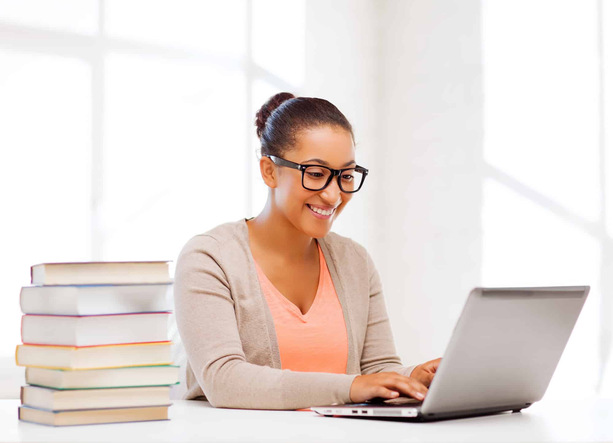 a young woman working at a computer