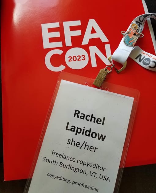 red EFACON folder and white badge reading Rachel Lapidow